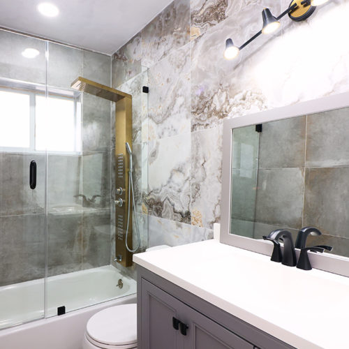 bathroom interiors with new recessed lighting and fixtures installed davie fl