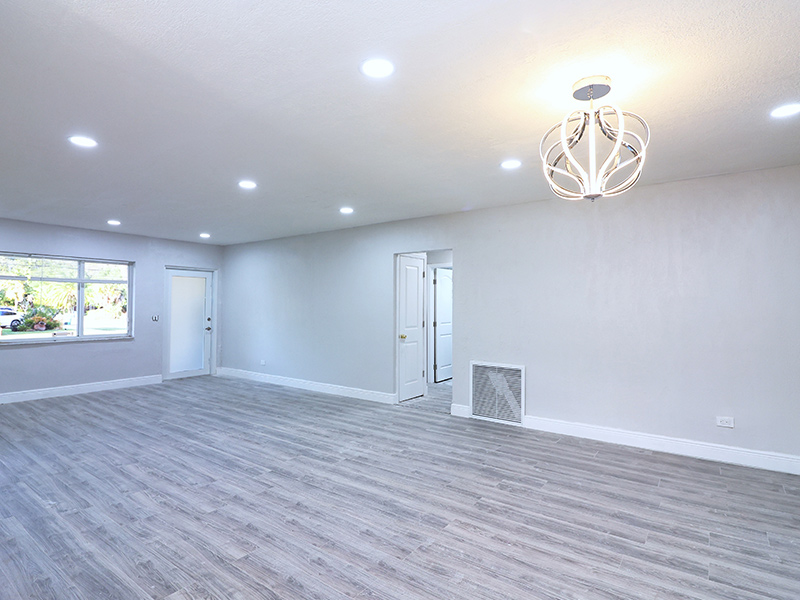 new constructed house interiors with recessed lighting and modern ceiling lamp davie fl
